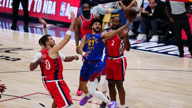 Denver Nuggets PG Jamal Murray getting to the cup against the Los Angeles Clippers in Game 1 of the first round in the 2025 NBA Playoffs. (Photo credit: Ron Chenoy-Imagn Images)